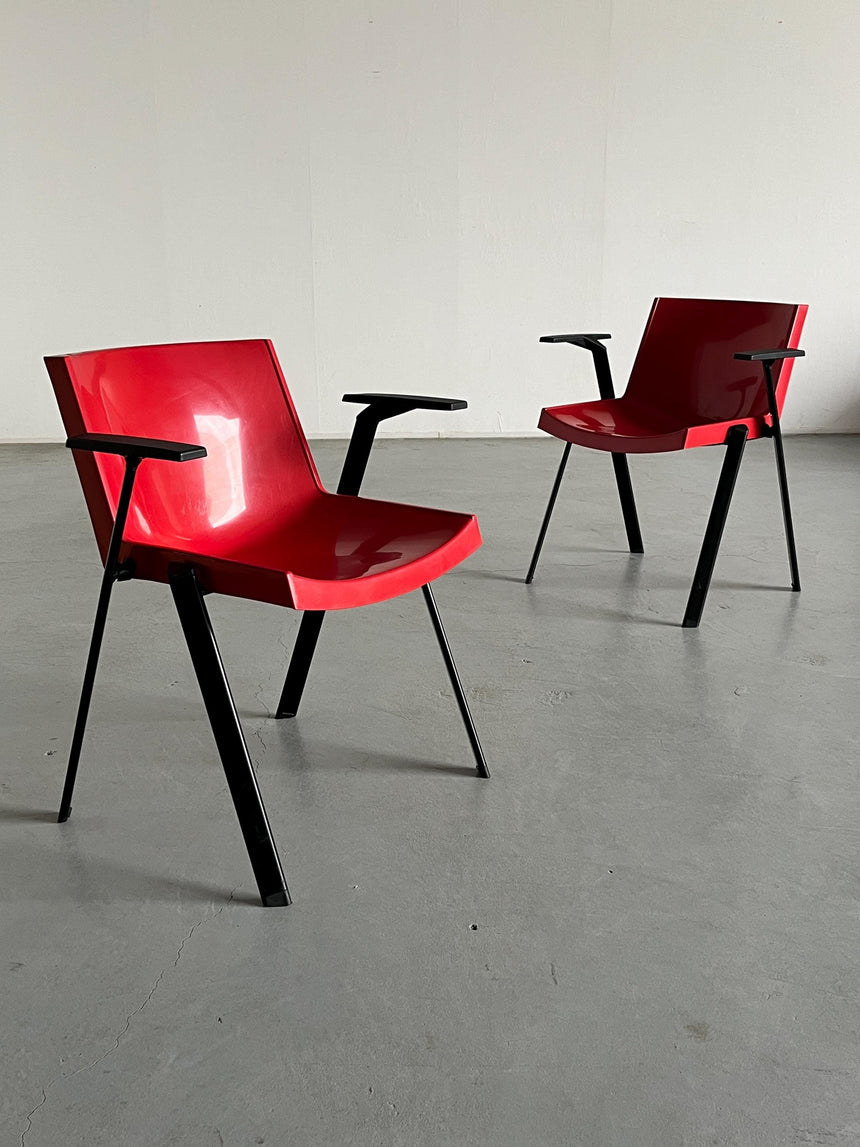 red arm chair by Coopsette
