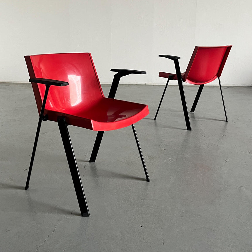 red arm chair by Coopsette